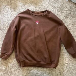 small brown mushroom sweatshirt